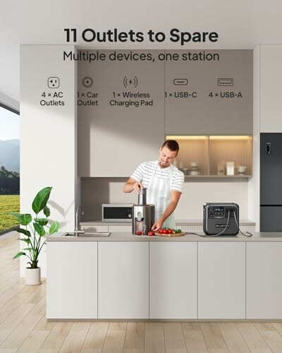 Man using a power station with various outlets in a modern kitchen.